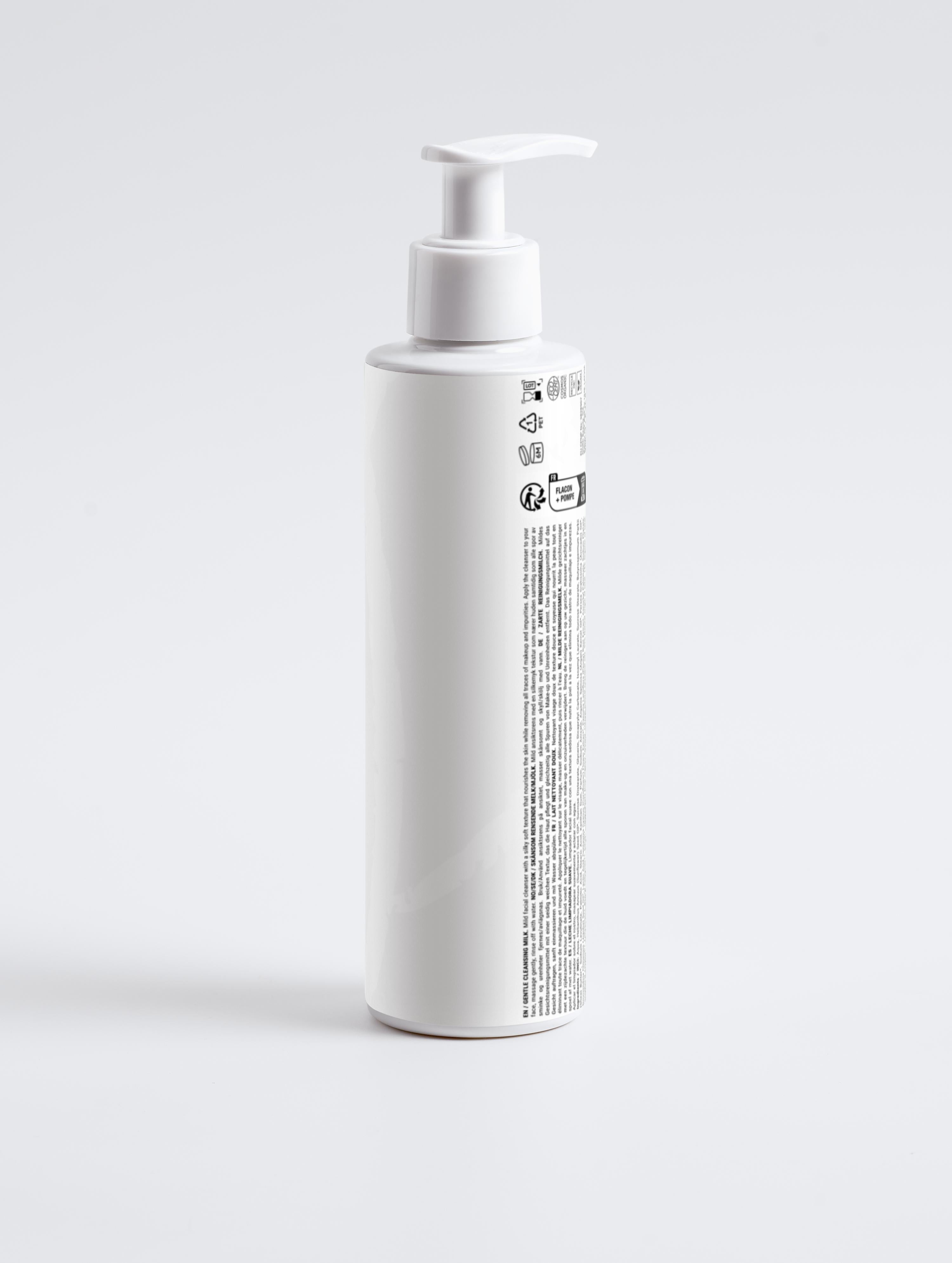 Eclat Soin Allergen Label Free Gentle Cleansing Milk in a sleek white bottle with a pump dispenser