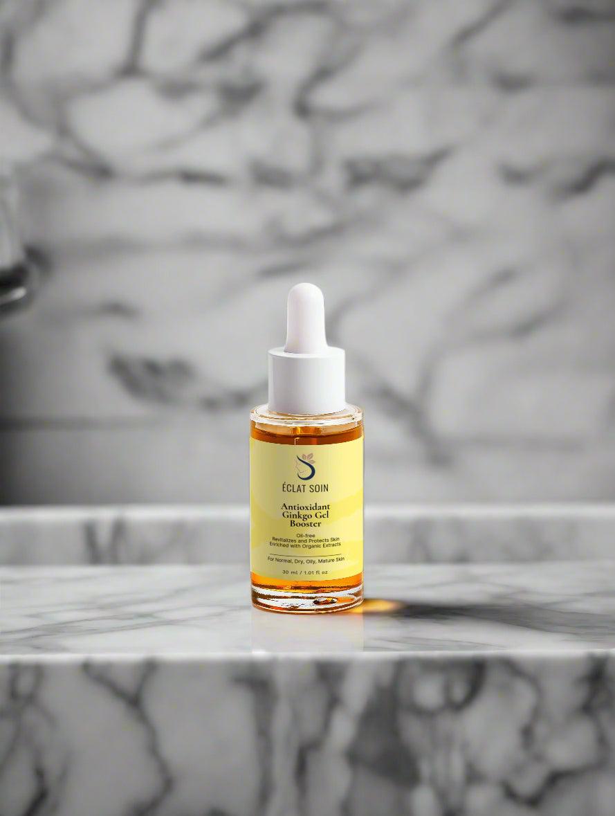 Eclat Soin Antioxidant Ginkgo and Green Tea Gel Booster in a glass dropper bottle on a marble countertop