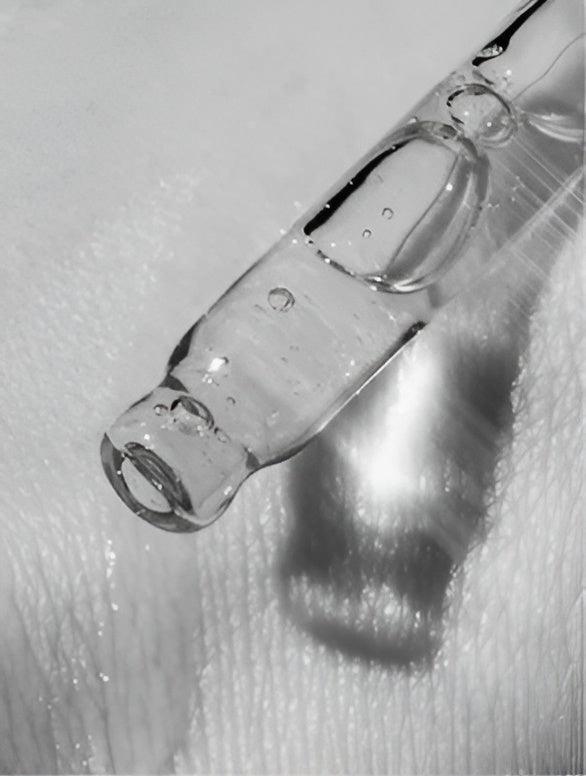 Eclat Soin Calming Facial Oil with Cannabidiol Droplet on Skincare Hand for Relaxation