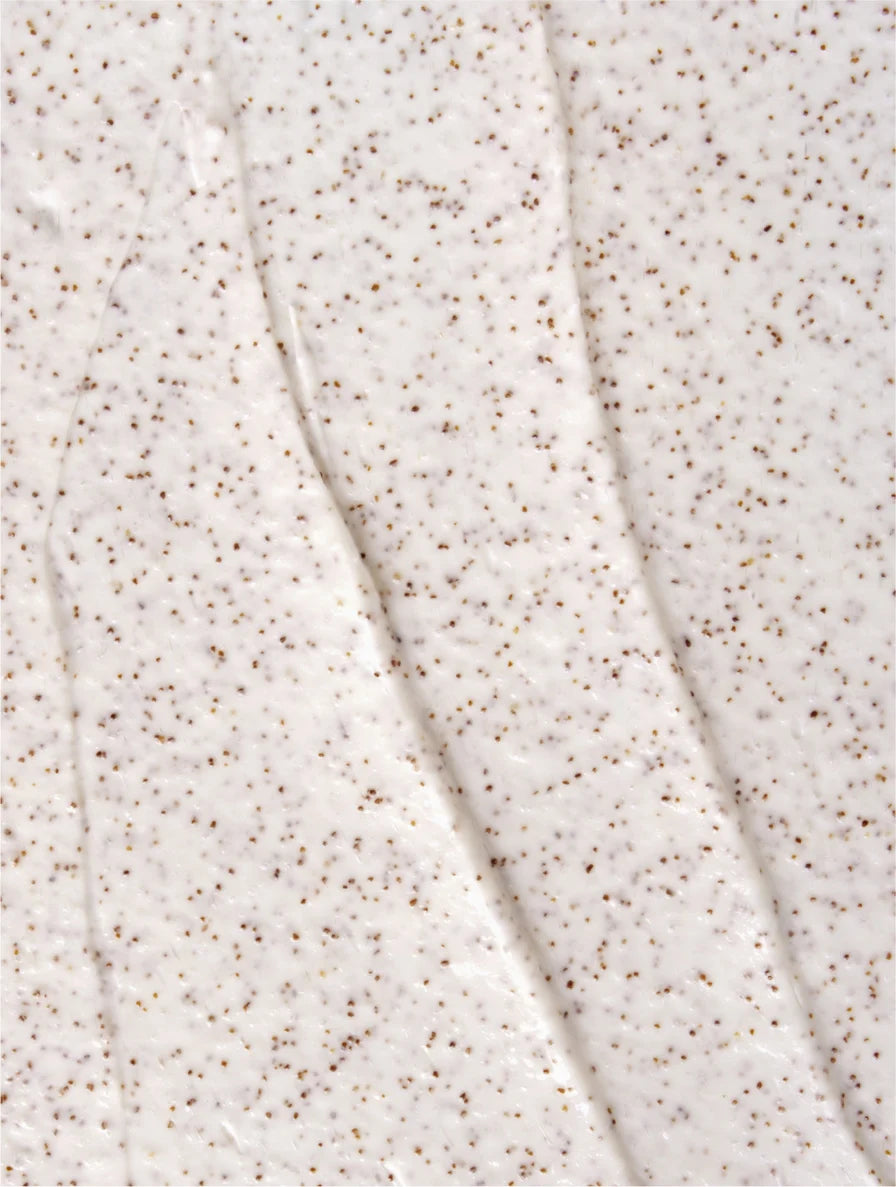 Close-up texture of Deep Cleanse Scalp Scrub with Keratin and Rosemary Oil by Eclat Soin showing exfoliating particles