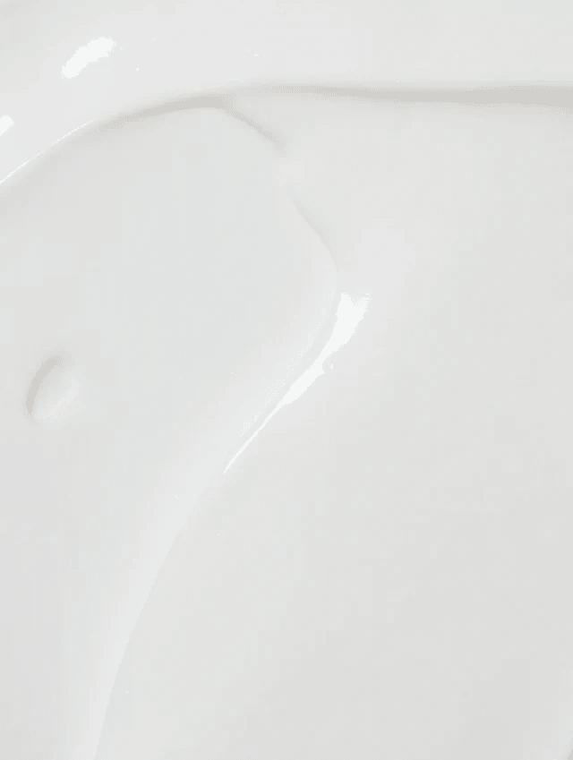 Close-up of Eclat Soin Hyaluronic Acid Face Cream for Men with a smooth, creamy texture