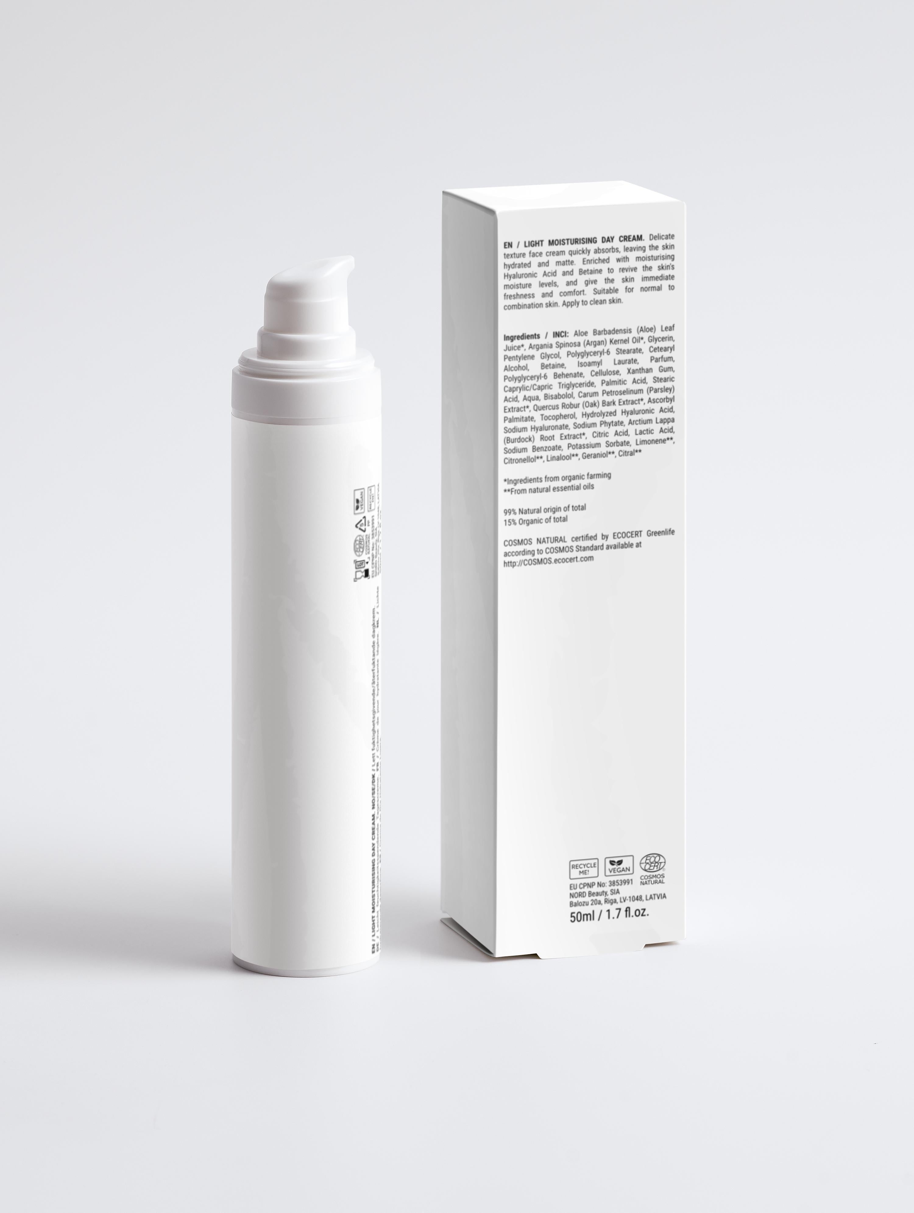 Eclat Soin Light Moisturising Day Cream in a white pump bottle with sleek packaging