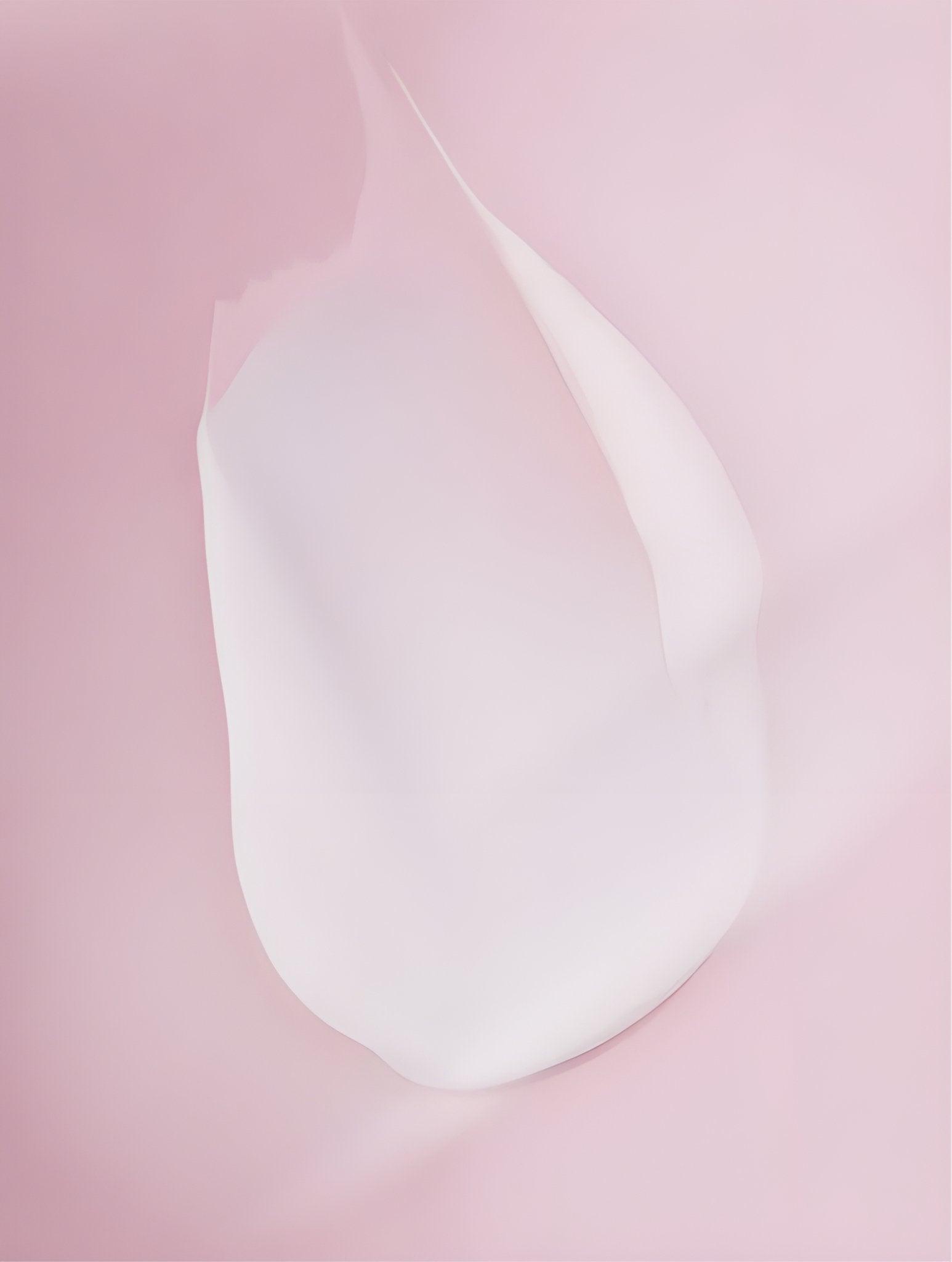 Eclat Soin Light Moisturising Day Cream in a smooth texture against a pastel pink background