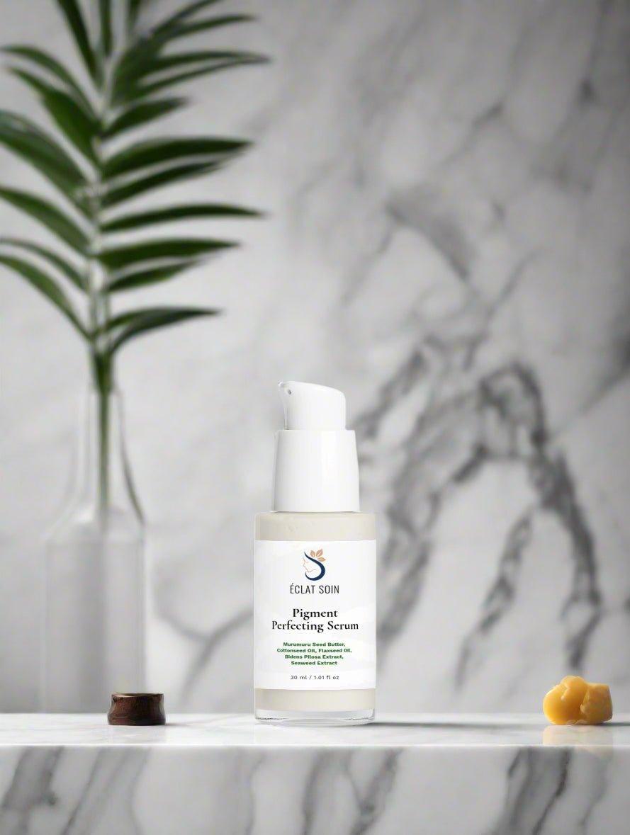 Eclat Soin Natural Pigment Perfecting Serum in a sleek bottle on a marble surface