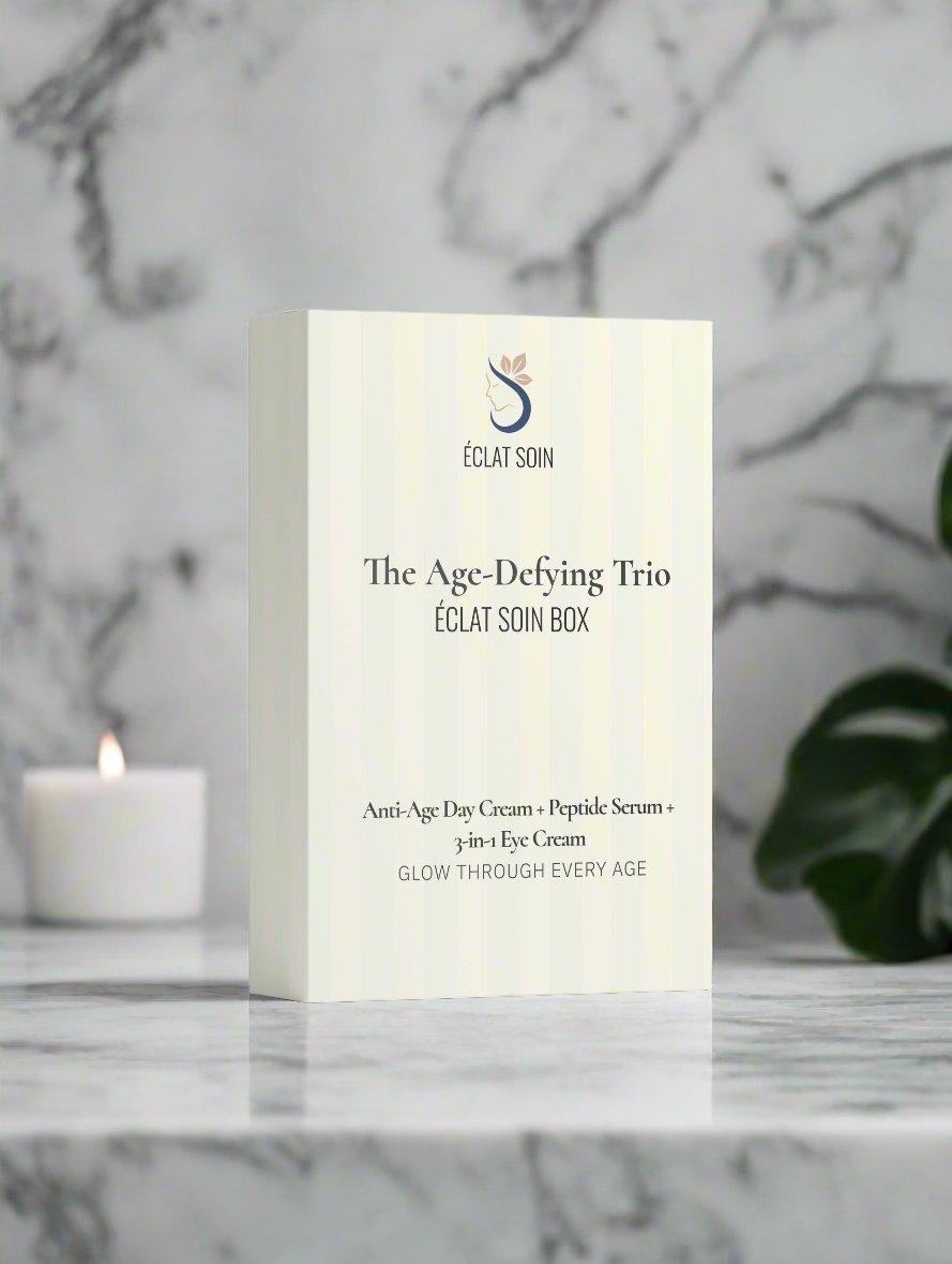 Eclat Soin The Age-Defying Trio Skincare Collection Box featuring anti-age day cream and peptide serum