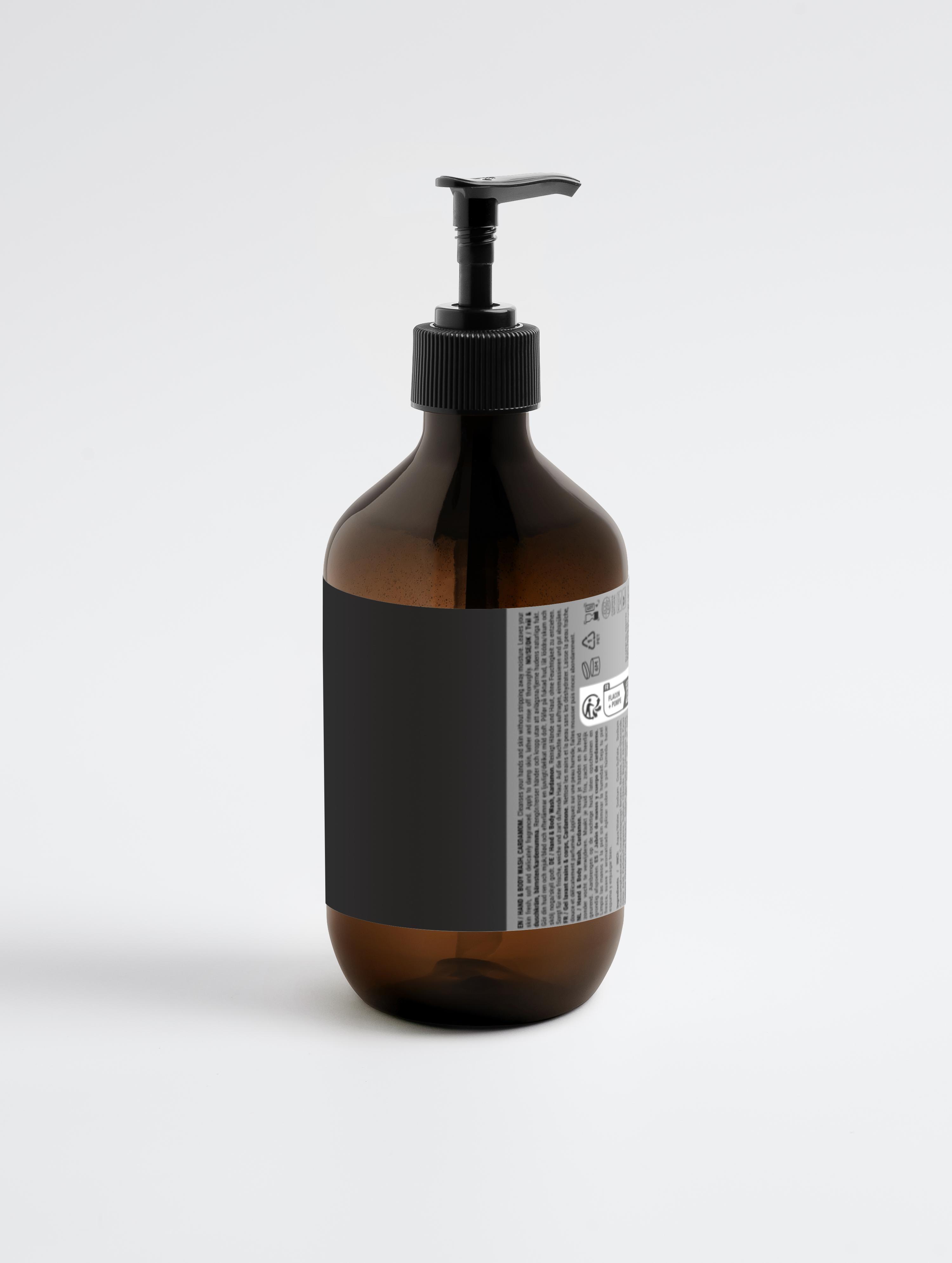 Eclat Soin Body Wash in an amber bottle with a pump for easy dispensing