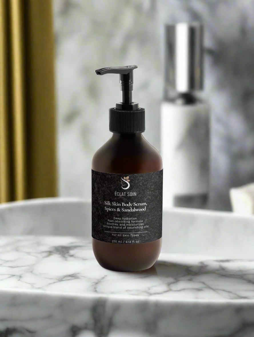 Eclat Soin Silk Skin Body Serum with Spices and Sandalwood in a stylish pump bottle